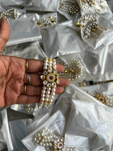 Elegant Pearl Beaded Bracelet with Gold Floral Design